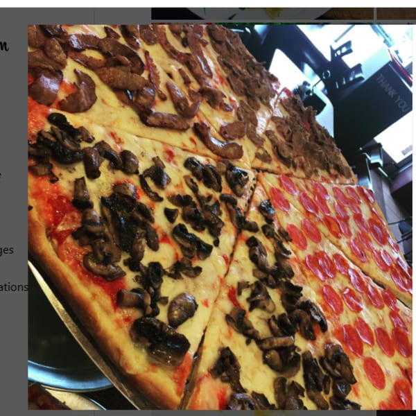 Large Pennachio's pizza with slices of pepperoni, mushroom, and steak toppings.